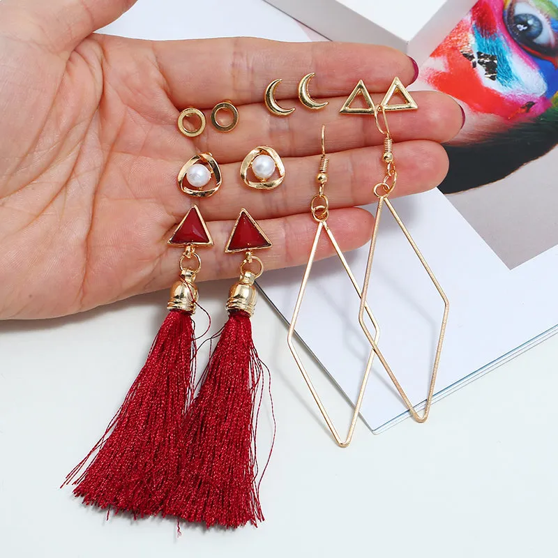 أقراط قلب أحمر ذهبية متدلية