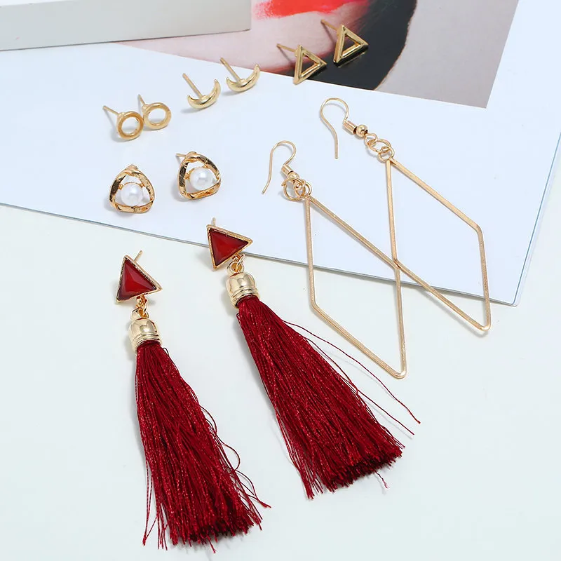 أقراط قلب أحمر ذهبية متدلية