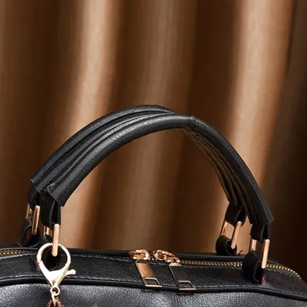 Trendy Black Barrel Handbag | Pom-Pom Charm and Pockets