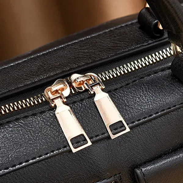 Thumbnail of Trendy Black Barrel Handbag | Pom-Pom Charm and Pockets