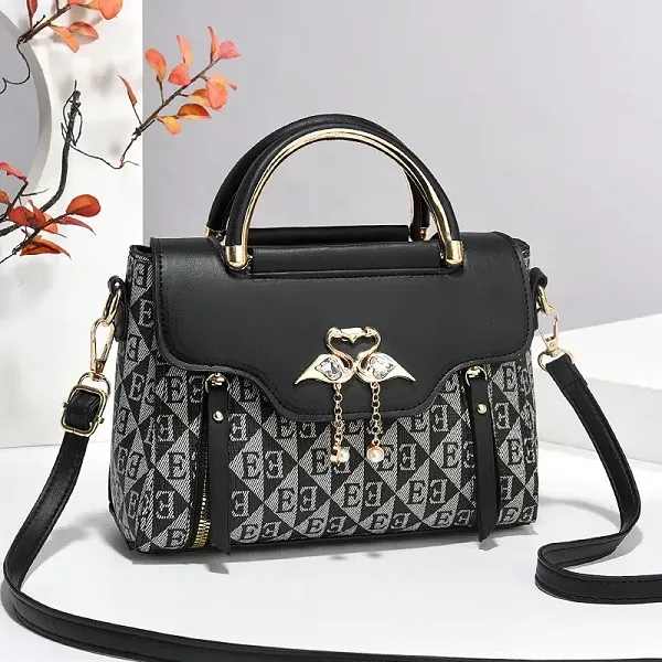 Elegant Patterned Handbag With Gold Accents