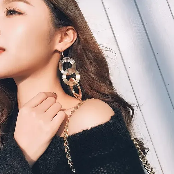 Thumbnail of Silver Triple Hoop Drop Earrings | Trendy Statement Jewelry