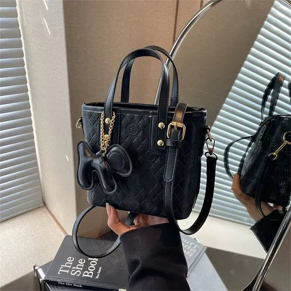 Thumbnail of Quilted Mini Handbag with Cute Puppy Charm Keychain