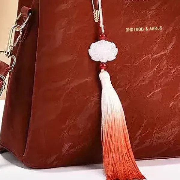 Thumbnail of Elegant Textured Handbag with Tassel Charm