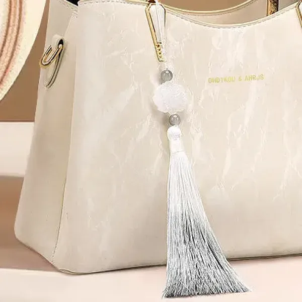 Thumbnail of Elegant Textured Handbag with Tassel Charm