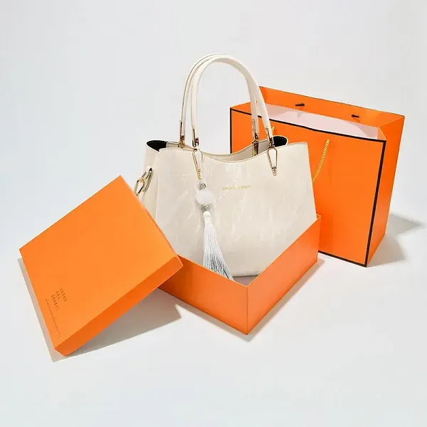 Thumbnail of Elegant Textured Handbag with Tassel Charm