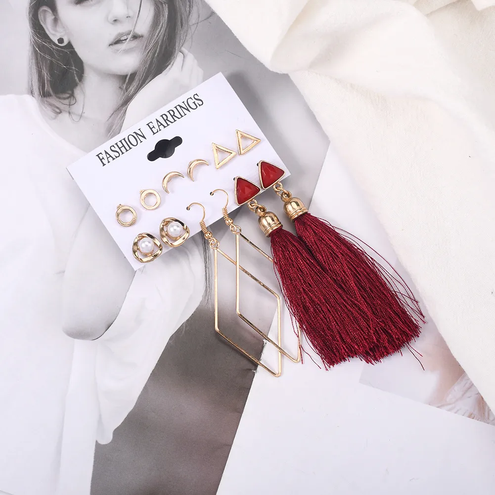 أقراط قلب أحمر ذهبية متدلية