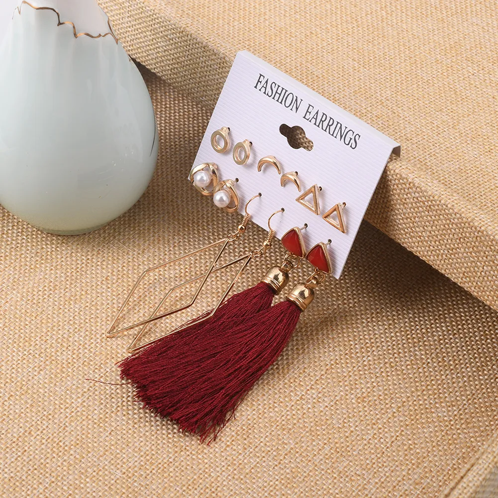 أقراط قلب أحمر ذهبية متدلية