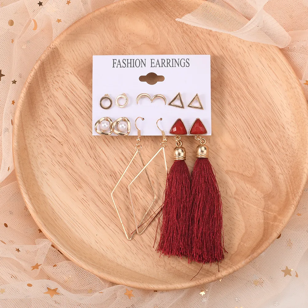 أقراط قلب أحمر ذهبية متدلية