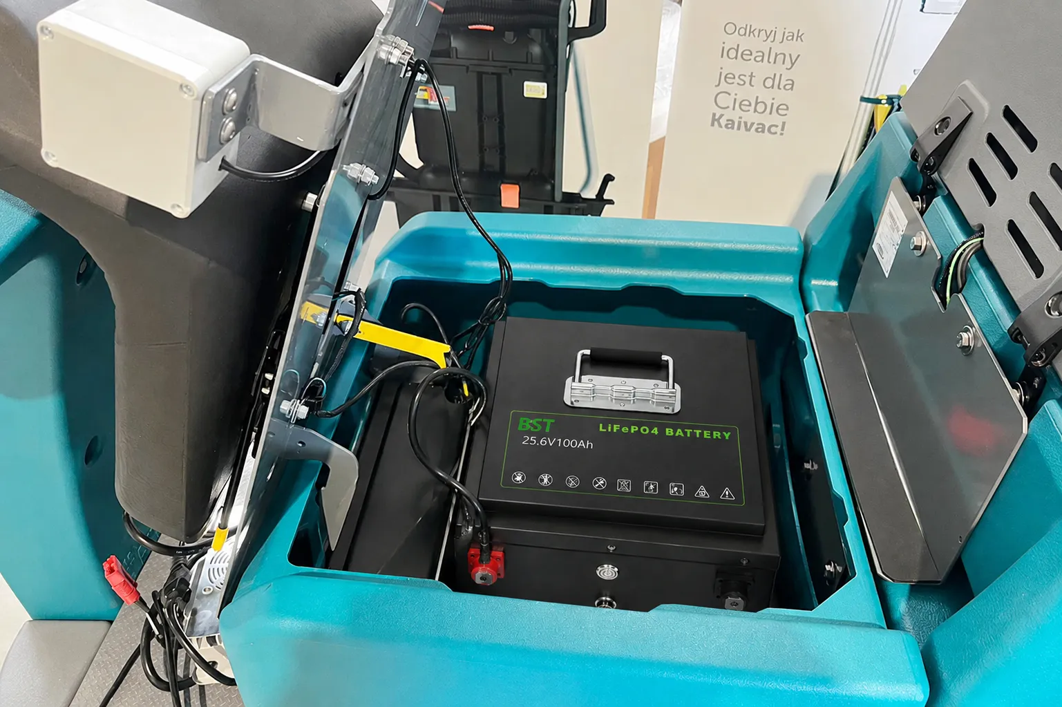 25.6V 100Ah LiFePO4 battery installed in a commercial floor cleaning machine