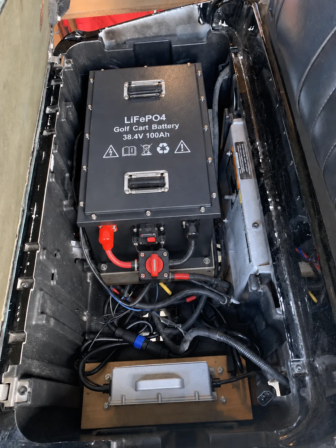 38.4V 100Ah LiFePO4 battery installation in a compatible 36V E-Z-GO TXT golf cart