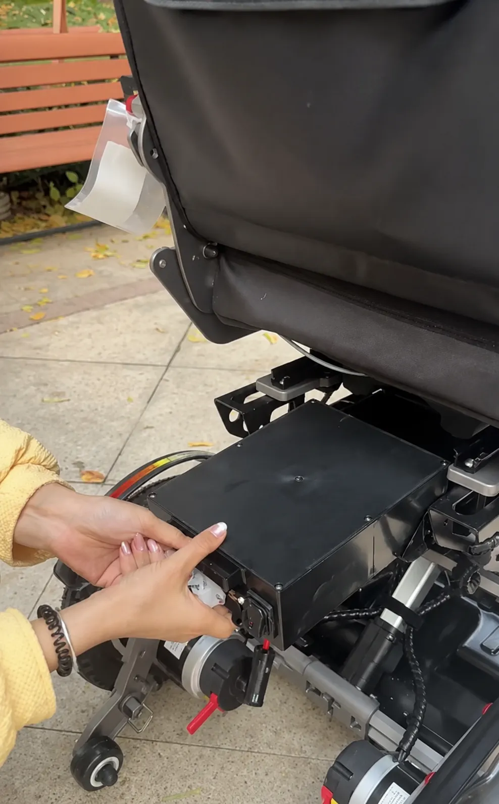 12V 45Ah LiFePO4 battery installed in an electric wheelchair battery compartment