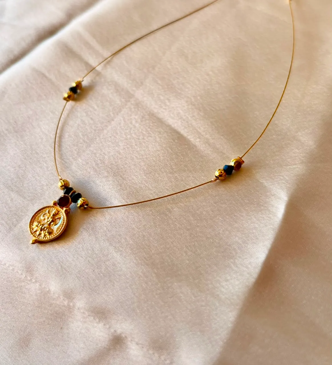 Lakshmi pendant invisible chain