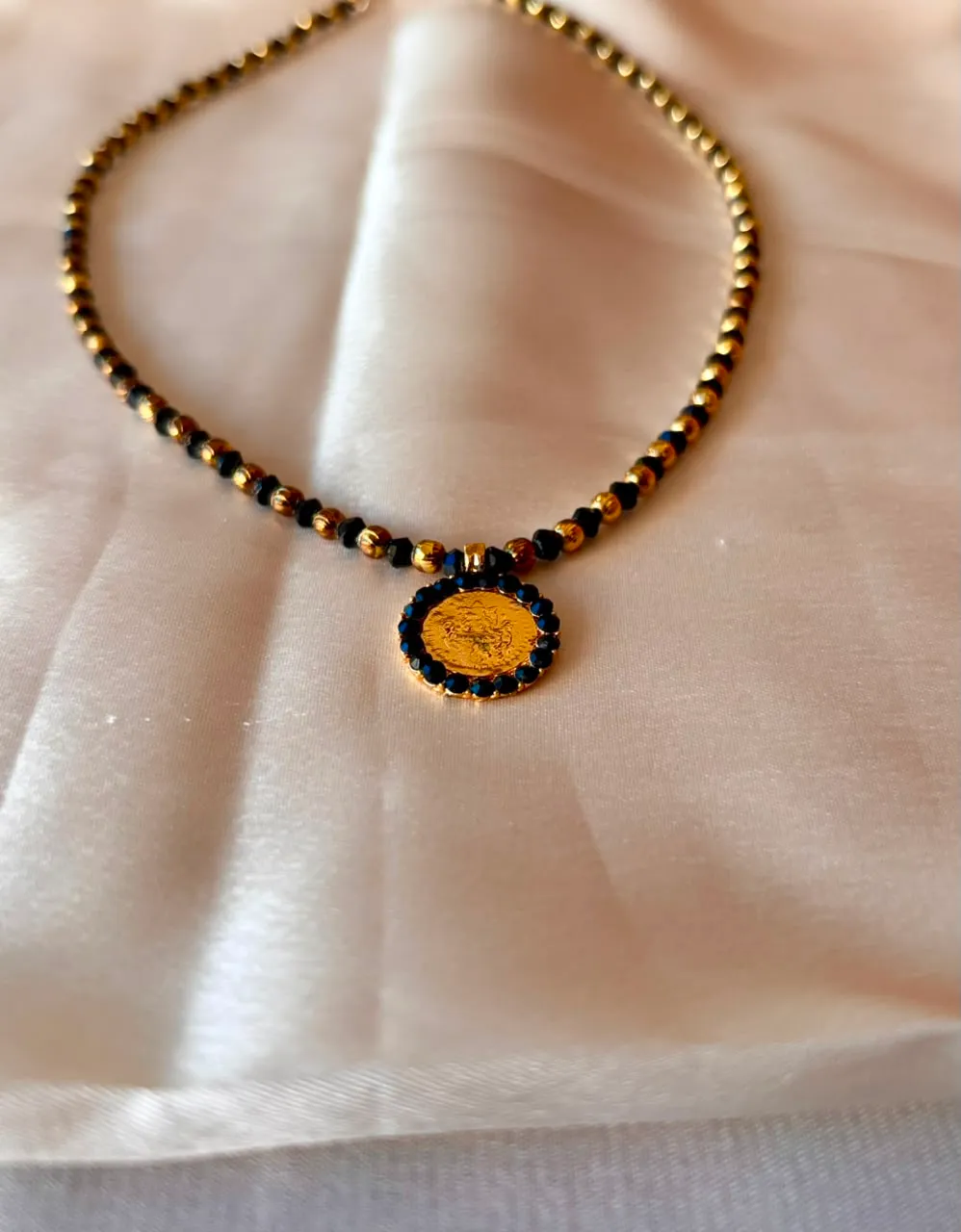 Lakshmi pendant karimani mala