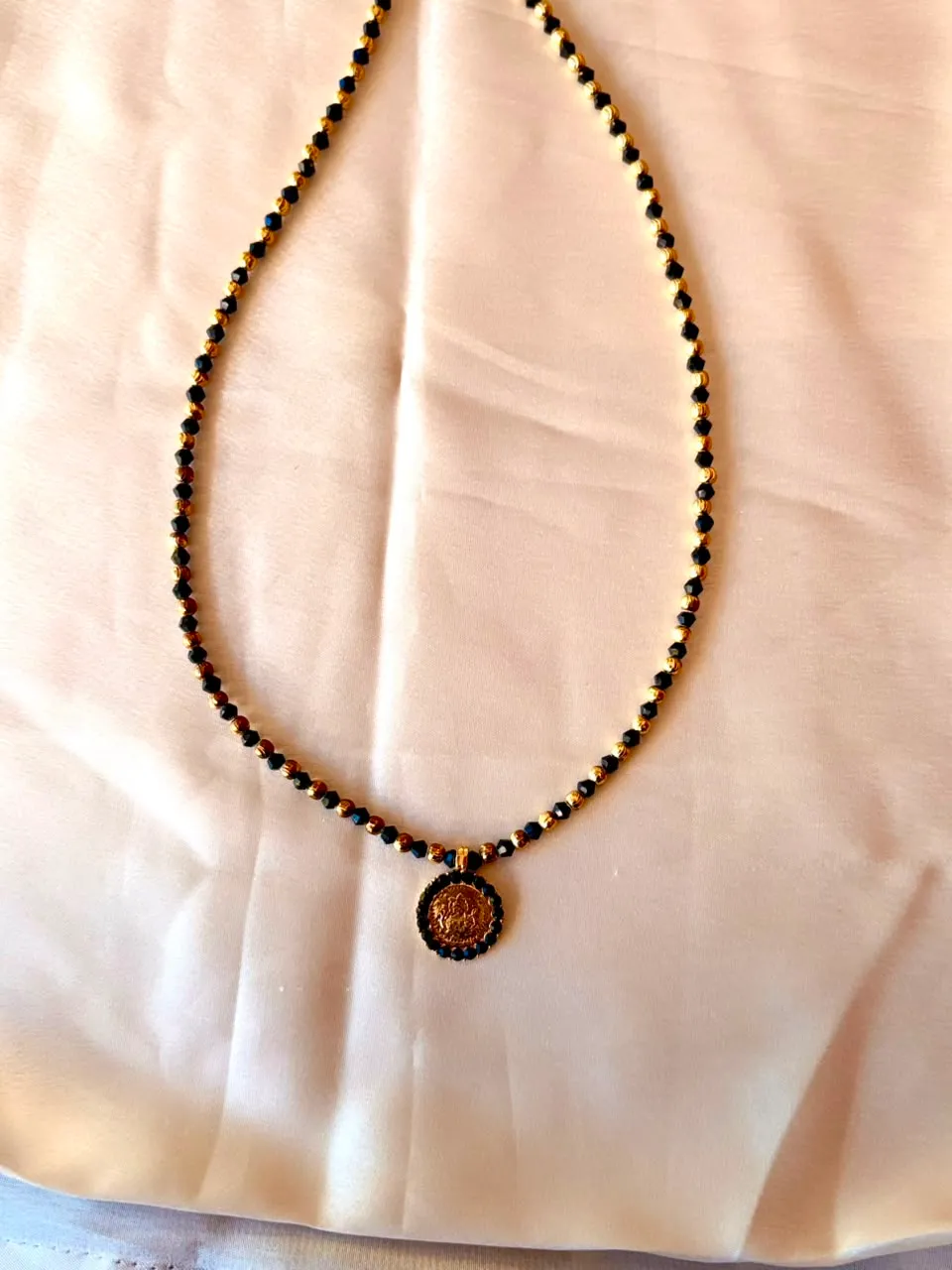 Lakshmi pendant karimani mala