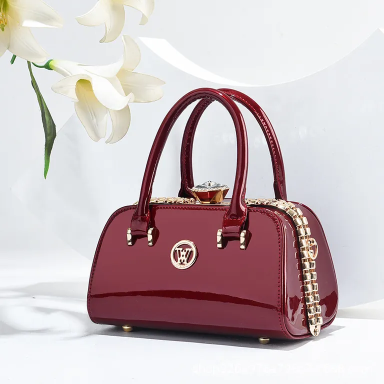 Glossy Burgundy Handbag With Chain Detail