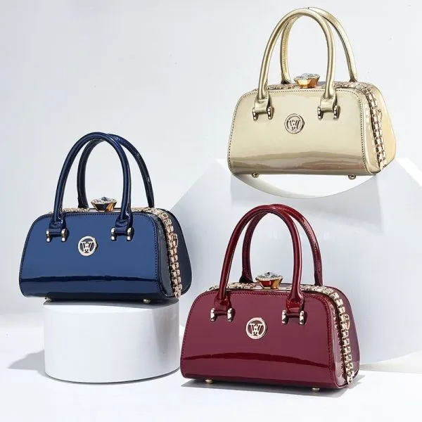 Glossy Burgundy Handbag With Chain Detail