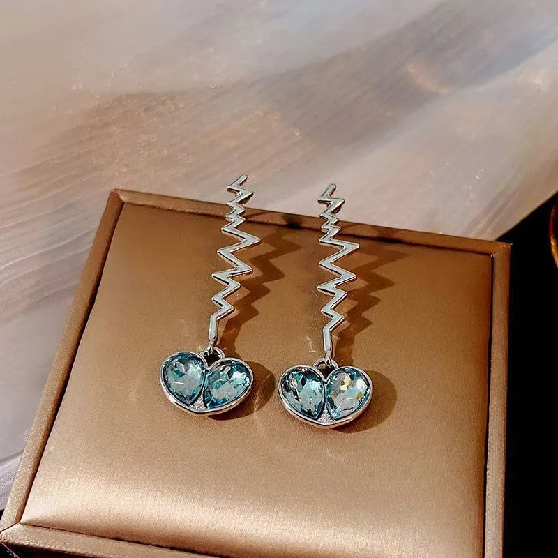 Heart-Shaped Blue Crystal Earrings With Zigzag Design