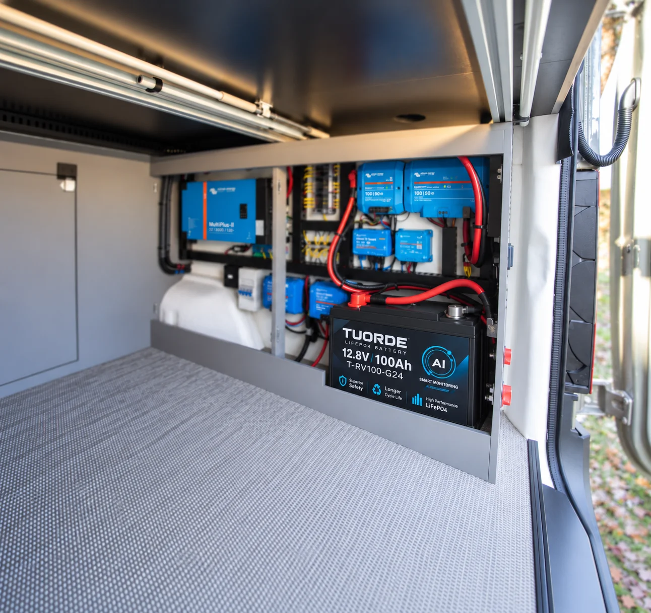 TUORDE Group 24 lithium battery installed in compact RV camper van battery compartment with 12V LiFePO4 power system